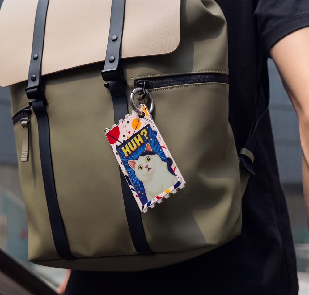 TICKEY attached to a backpack